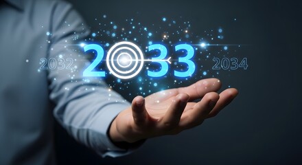 A person holding a digital projection of the year 2033 with a target symbol in the middle