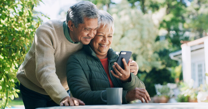 Backyard, happy and senior couple with phone for funny conversation, bonding and relax outdoor Retirement home, garden and mature man and woman laugh on smartphone for internet, connection or website