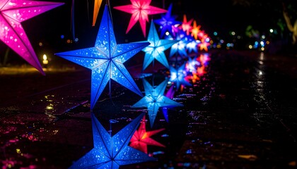 Vibrant star-shaped lanterns, glowing in a myriad of colors, cast dazzling reflections on a wet pavement at night.