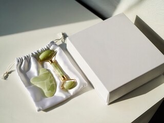 Jade stone gua sha and jade roller with silk pouch gift box for woman wellness beauty skincare and facial massage