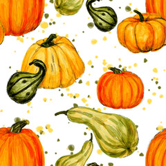 Bright pumpkins. Seamless autumn pattern of bright pumpkins on a background of colored splashes.