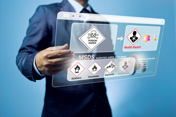 Toxic gas and warning labels concept with safety staff checking hazard data for inhalation respiratory toxic chemicals on virtual interface display screen for personal protection equipment