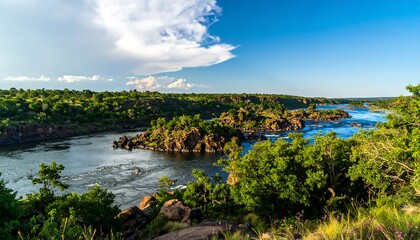 Scenic river landscape with lush vegetation and rocky shoreline.
