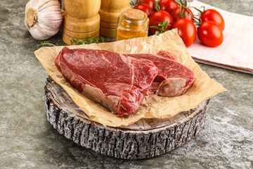 Raw marble uncooked beef steak
