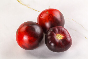 Black ripe juicy organic tomato