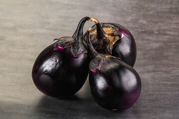 Raw violet and black eggplant