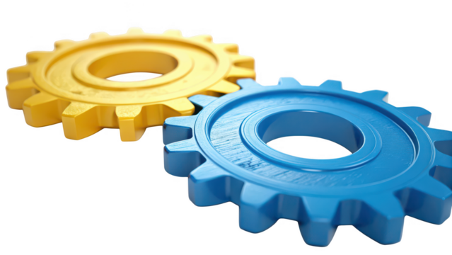 Two colorful plastic gears one yellow and one blue interlocking and isolated on transparent background