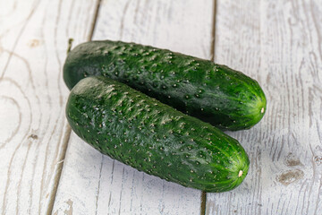 Ripe green raw two cucumbers