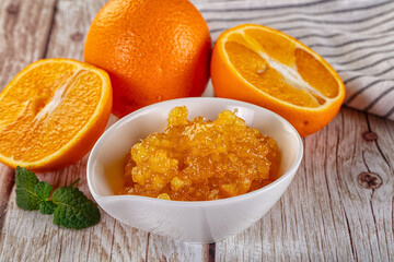 Sweet orange jam in the bowl