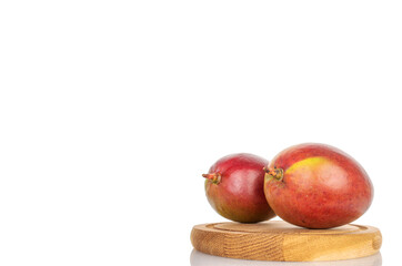 Sweet juicy mango isolated on white background, close-up.