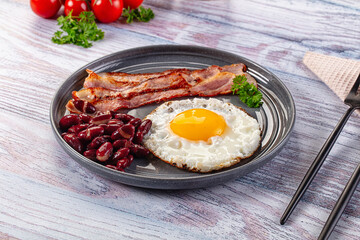 English breakfast with egg, bean and bacon
