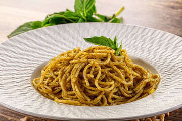Italian green pasta with pesto sauce