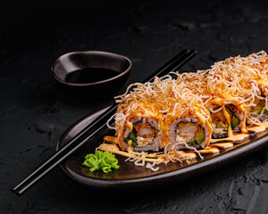 Delightful sushi rolls served with wasabi and soy sauce at gourmet restaurant