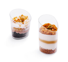 Delicious layered desserts served in clear cups at a dessert shop