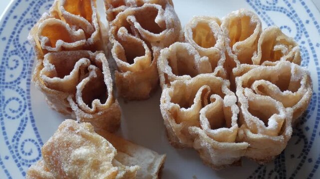 Delicate flor frita, Spanish fried pastry also called flor de Lis.