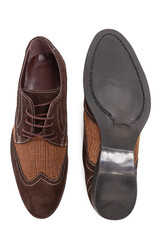 Footwear Concepts. One Pair of Stylish Classic Formal Male Black Polished Derby Leather Laced Shoes Placed Together Over White.