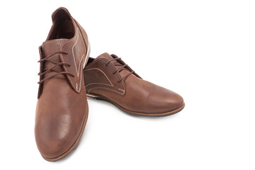 Footwear Concepts. One Pair of Stylish Classic Formal Male Light Brown Calf Leather Derby Laced Shoes Placed Together Over White.