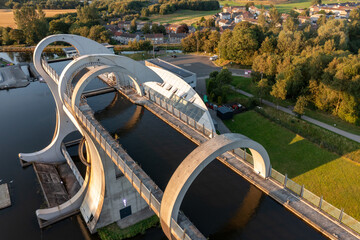 Aerial view of the Falkirk Wheel, a rotating boat lift connecting the Forth and Clyde Canal with the Union Canal, Falkirk, Scotland, United Kingdom.