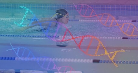 Female swimmer initiating butterfly stroke in pool generating DNA overlays for sports technology - Powered by Adobe