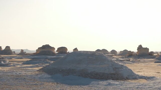 White rock formations and sand dunes in Egypt's White Desert, a natural desert landscape	