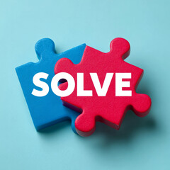 Red and blue puzzle pieces with 'SOLVE' text.