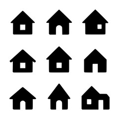 Fototapeta premium Set of Nine Minimalistic Black House Silhouettes on White Background