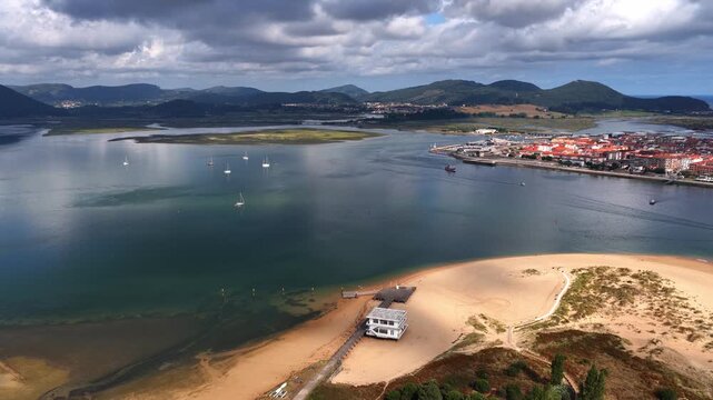 drone shot of the coast of Cantabria, Laredo resort on the Cantabrian coast of Spain, tourism in northern Spain, Spanish coastal landscape