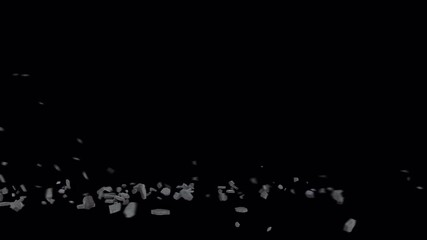 Dynamic Concrete Debris Fragments Scattering Upwards on Black Background