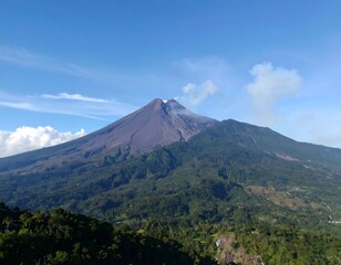 Fototapeta premium Volcanic mountain peak with smoke