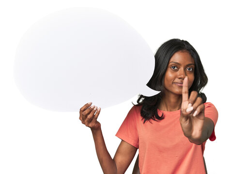 Indian woman with dialogue bubble showing number one with finger.
