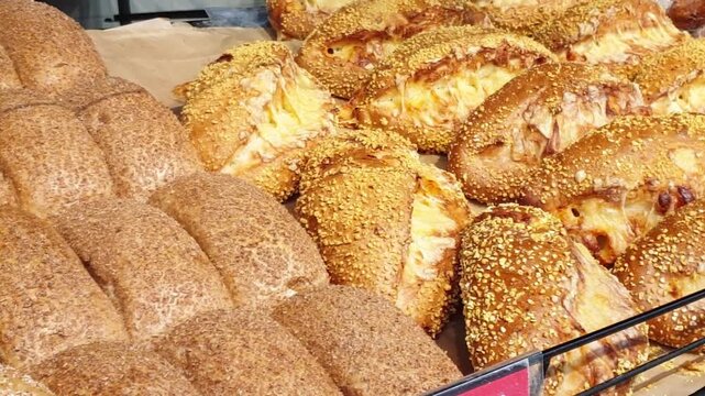 Footage of the various bread products in the bakery shop. Food