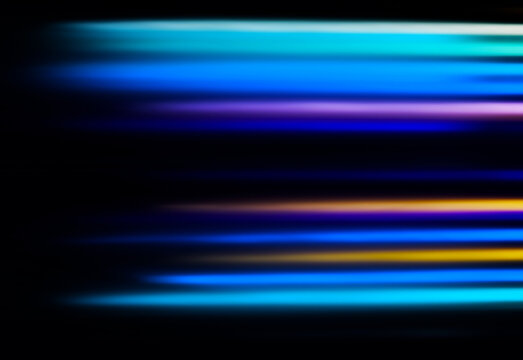 light through Stack of different colours Cast Acrylic Sheet on black background