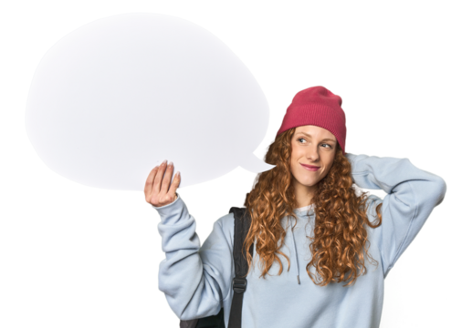 Redhead holding a comic speech bubble touching back of head, thinking and making a choice.