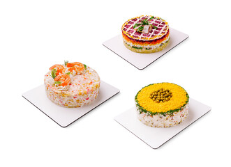 Colorful and creative seafood salad cakes on display for a festive occasion