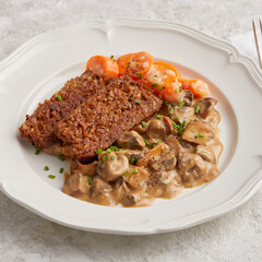 Nut roast with mushroom cream sauce
