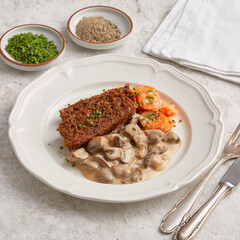 Nut roast with mushroom cream sauce