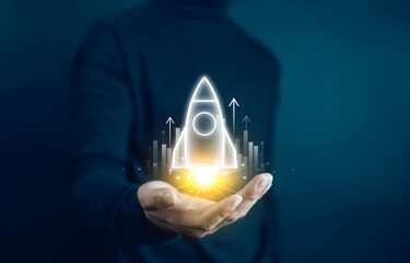 
Businessman touching transparent rocket icon launching. Startup concept, rocket, company growth, success, technology, marketing, finance, innovation, creative design project.