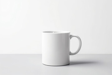 Obraz premium Empty White Ceramic Mug on a Gray Surface beverage