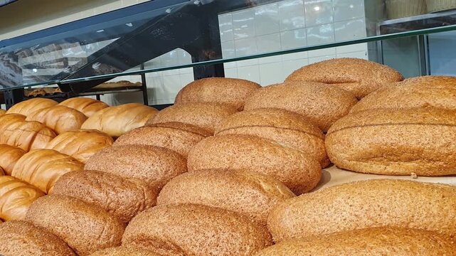 Footage of the various bread products in the bakery shop. Food