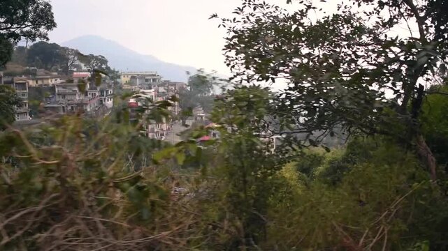View from the historic toy train window on the way from Shimla to Kalka, a UNESCO World Heritage Site in Himachal Pradesh, India.