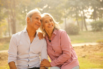 Fototapeta premium Senior Couple Enjoys A Sunny Day In The Park