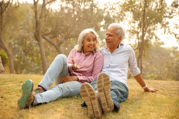 Fototapeta premium Indian Old Couple Enjoying A Joyful Moment In The Park