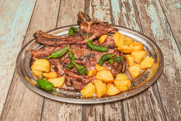 Galician blonde steak entrecote with mushroom sauce, served with thick-cut steakhouse-style fries