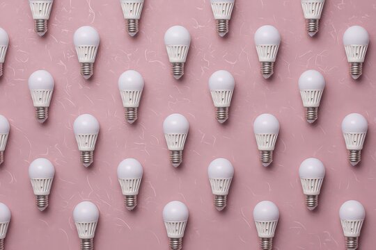 Organized Array Of Led Bulbs On Pink Background