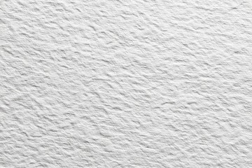 Close-up of a textured, light gray, uneven surface