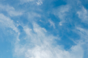 Blue sky with fluffy white clouds