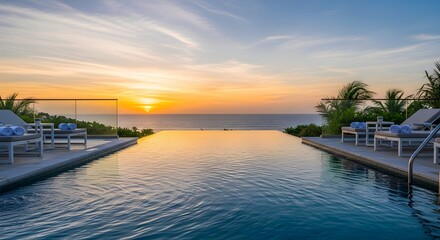 luxury infinity pool ocean sunset resort view
