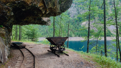 Old rail trolley on an abandoned  trail around Lake Campliccioli, Antrona Valley, Piedmont, Italy.