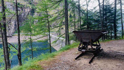 Old rail trolley on an abandoned  trail around Lake Campliccioli, Antrona Valley, Piedmont, Italy.
