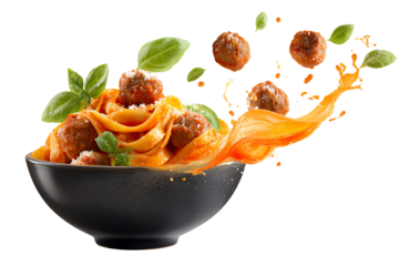 Delicious pasta dish with meatballs and fresh basil, artfully presented in a black bowl.